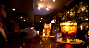 Drinking alone at a bar