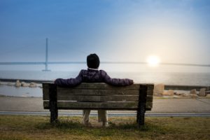 man resting on bench