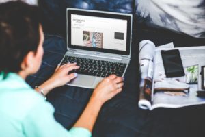 woman reading blog post